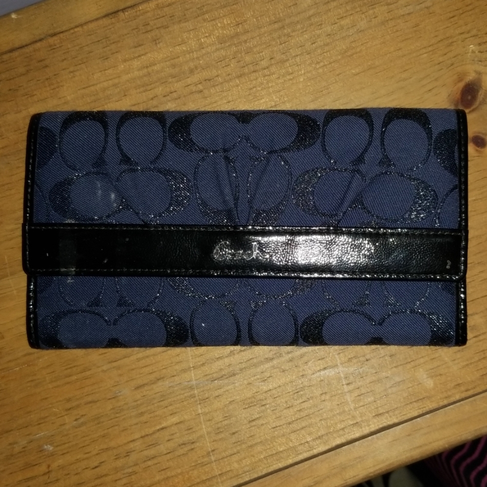 Coach with the signature Cs wallet